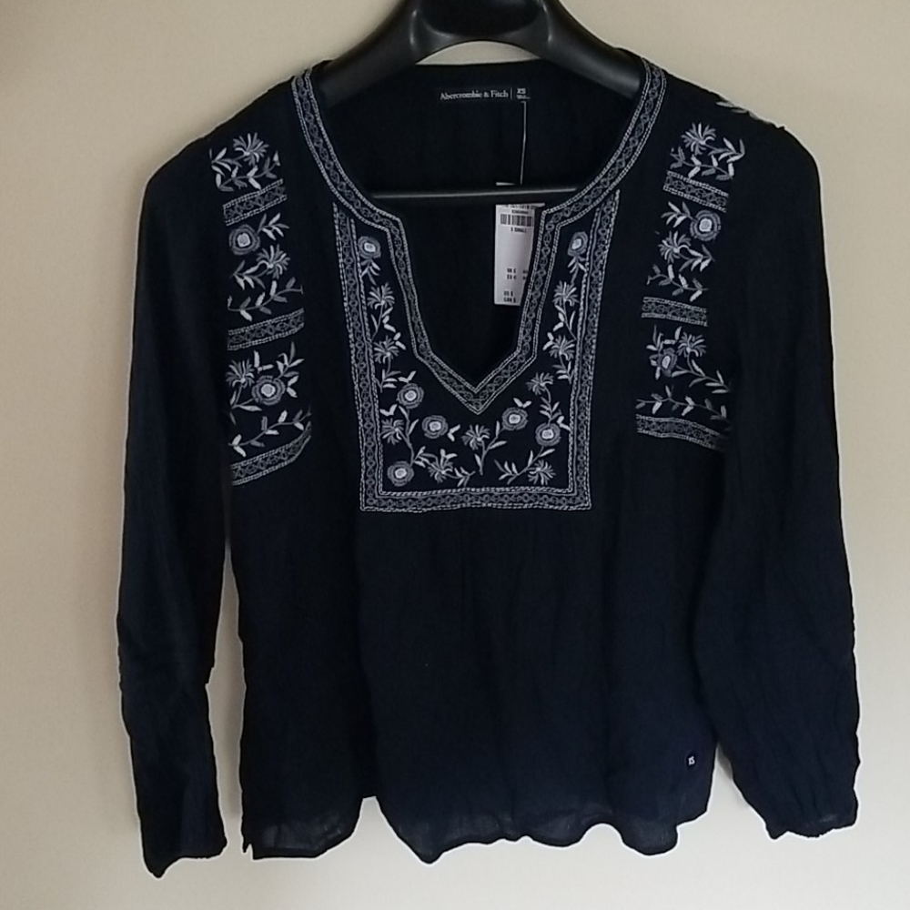 Long sleeve navy blouse with floral stitching